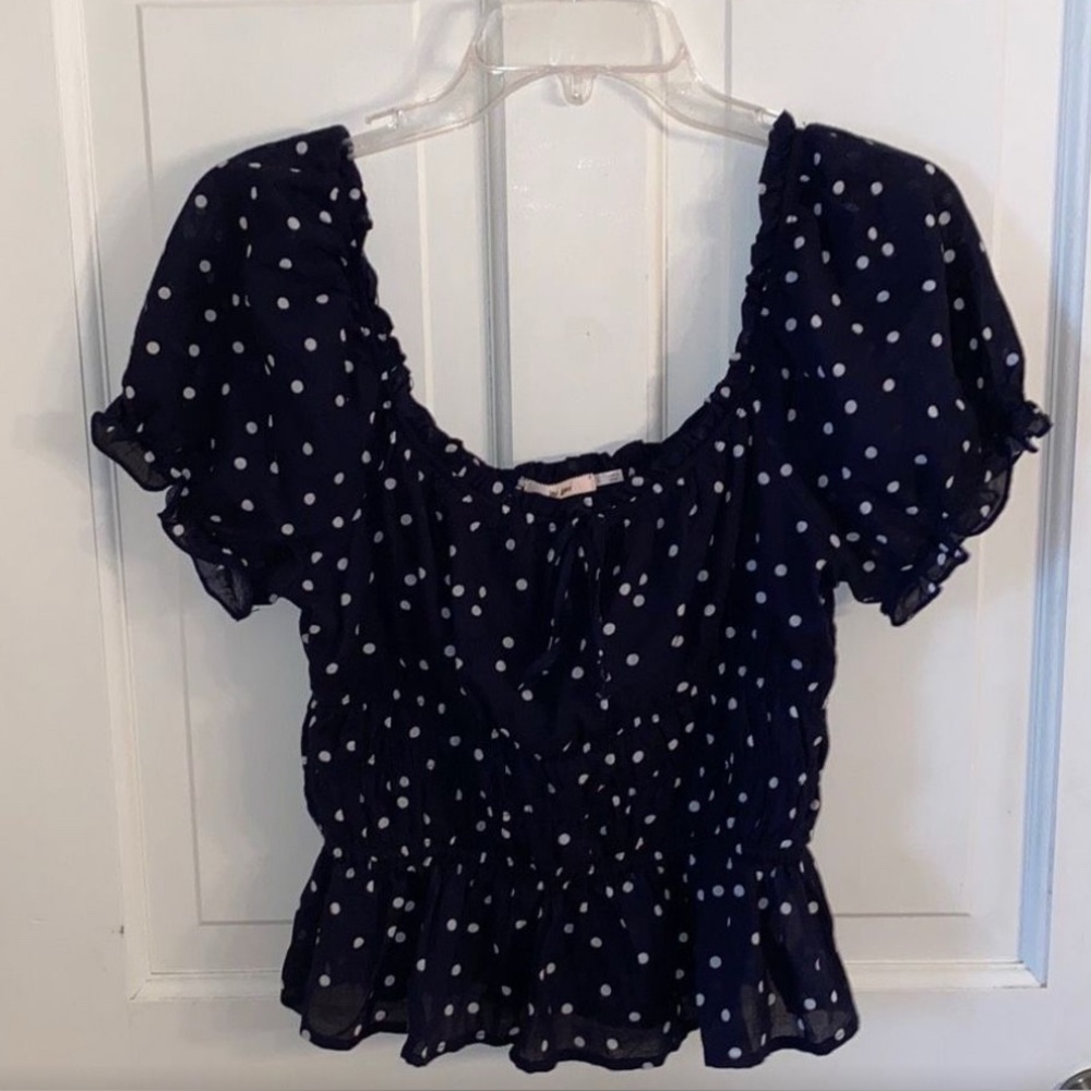 Ruched navy blue polka dot top, fits like small